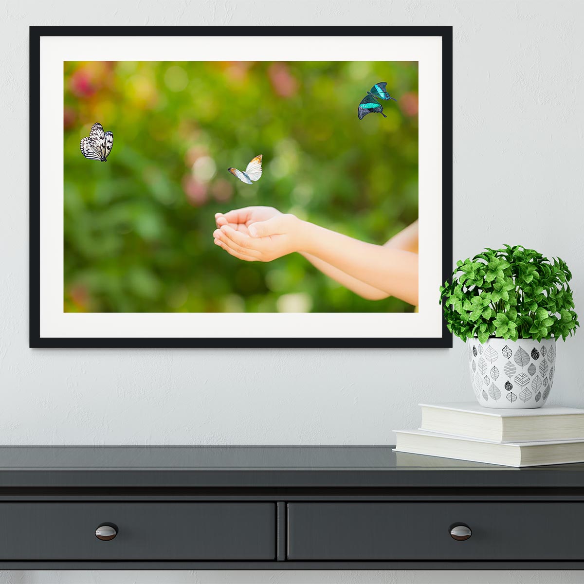 Children hands and flying butterfly Framed Print - Canvas Art Rocks - 1