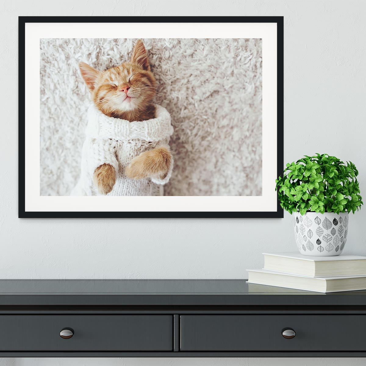 Cute little ginger kitten wearing warm knitted sweater Framed Print - Canvas Art Rocks - 1