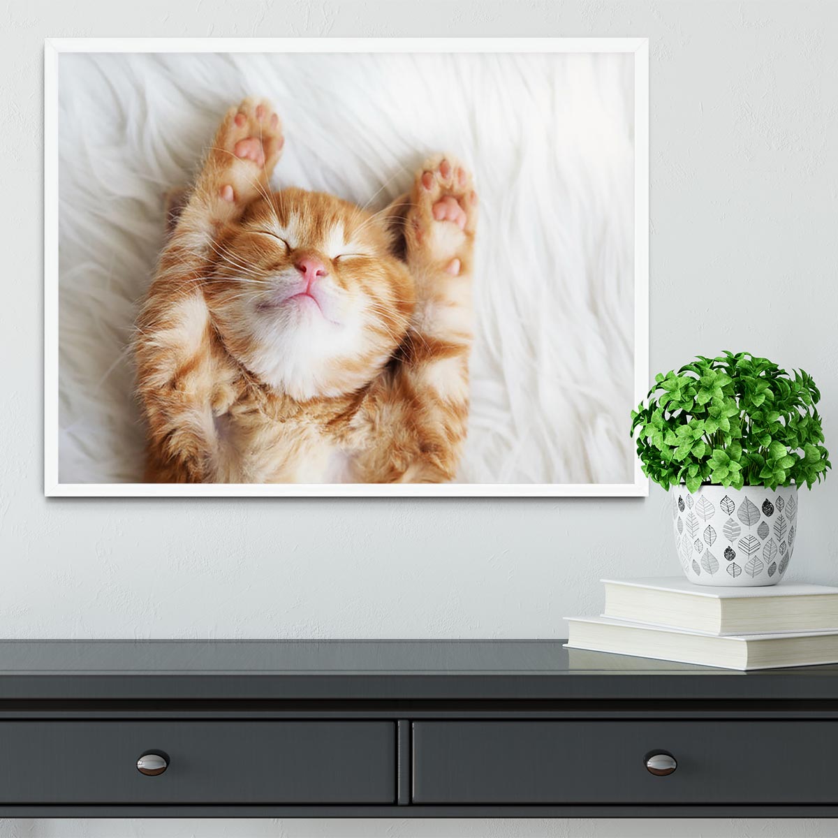 Cute little red kitten sleeps on fur white blanket Framed Print - Canvas Art Rocks -6